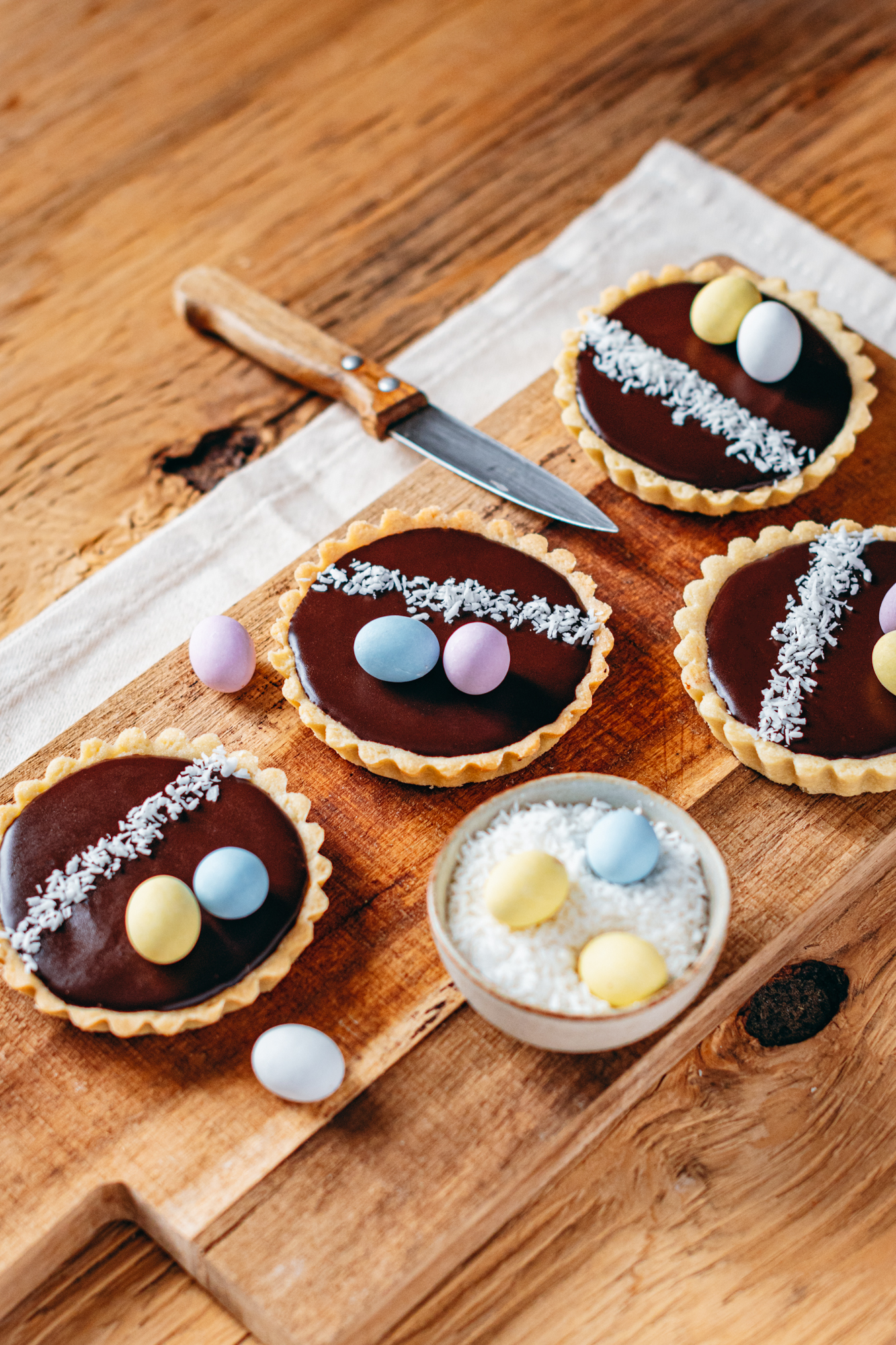 Tartelettes chocolat, pommes et coco